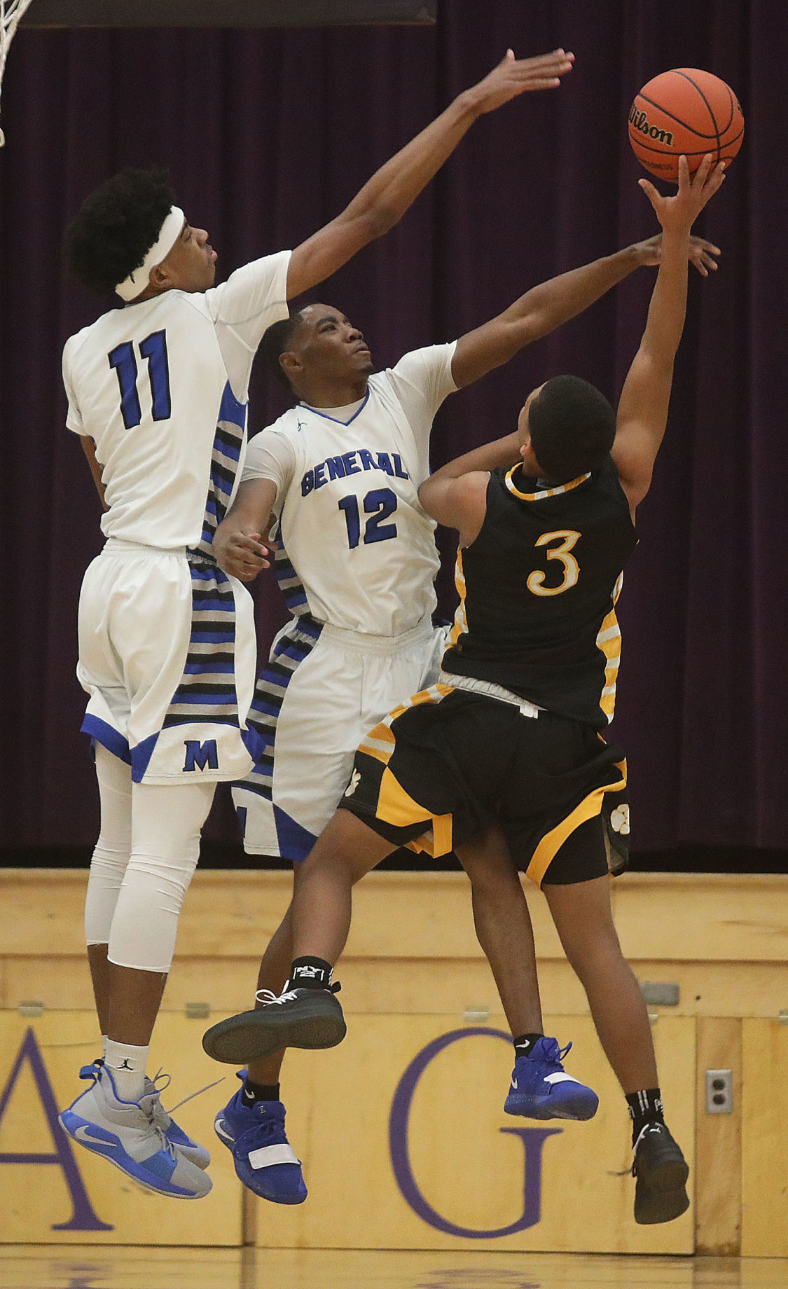 Eisenhower vs MacArthur boys basketball 26 2.25.19.jpg